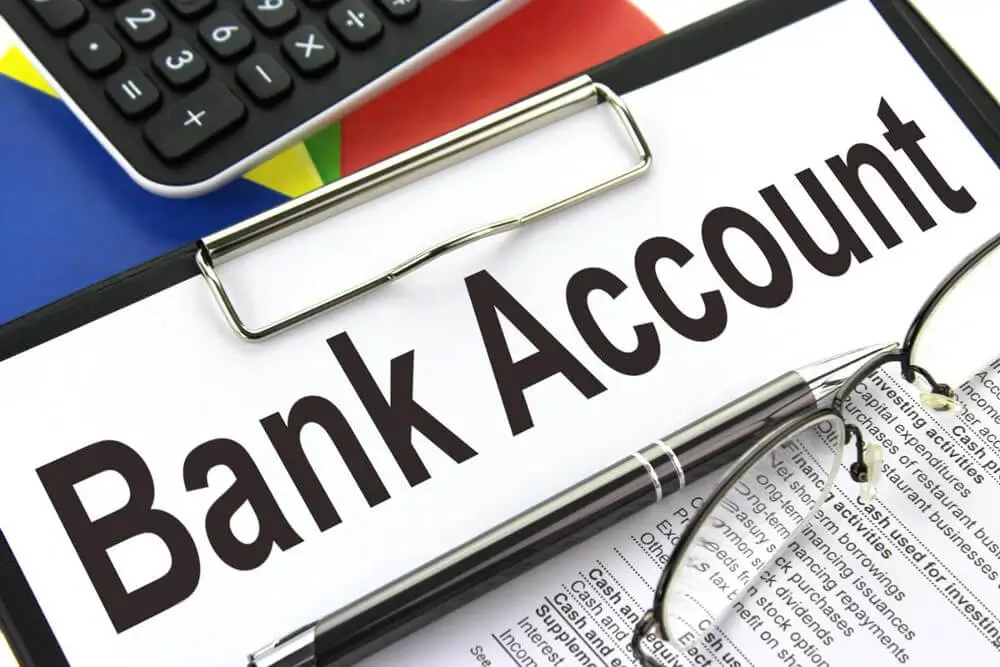 Bank account document with calculator
