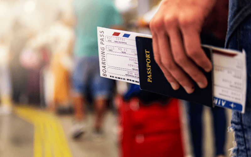 Passenger holding a boarding pass