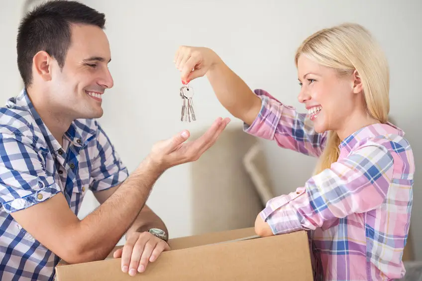 Couple with new house keys