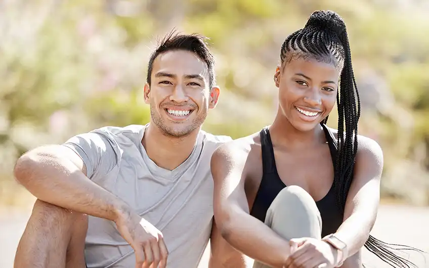 Couple reviewing their Sanitas health insurance together