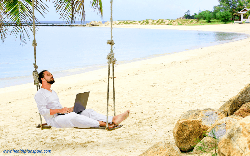 Digital nomad on beach