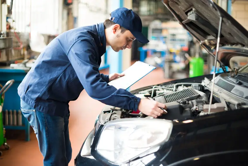 Mechanic doing an MOT test