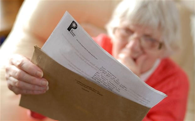 Pensioner reading pension letter