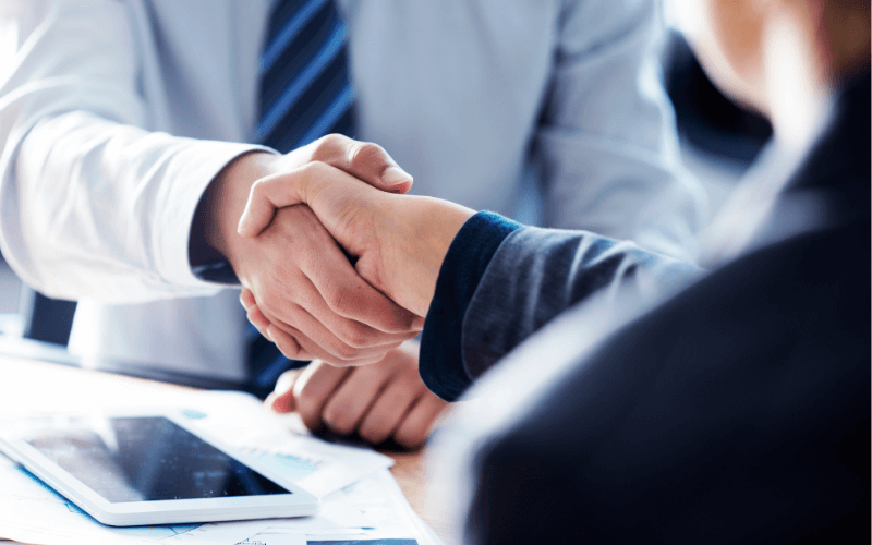 Handshake between business people