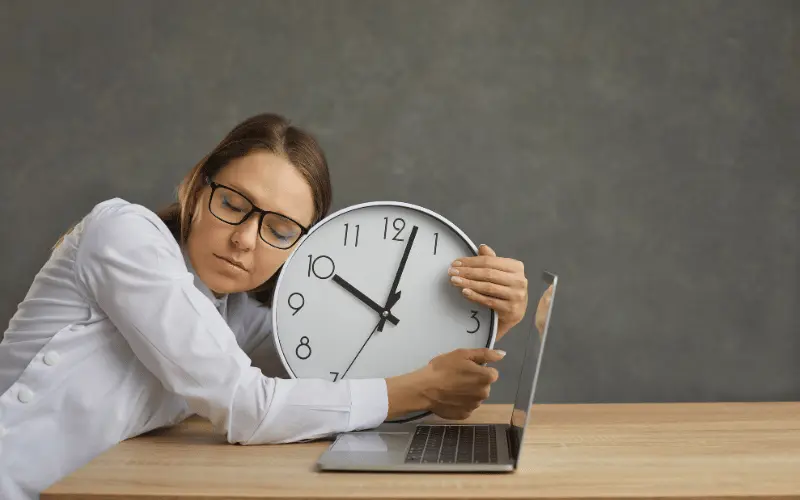 lady hugging a clock