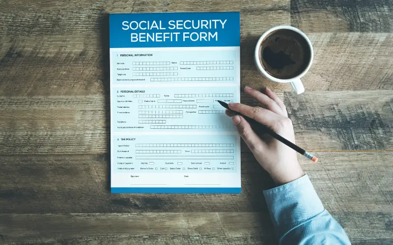 Social sescurity benefit form with a cup of coffee