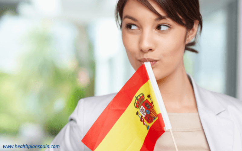 Woman holding Spanish flag