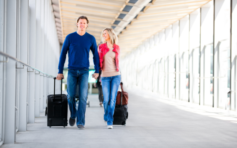 Airport travellers with suitcases