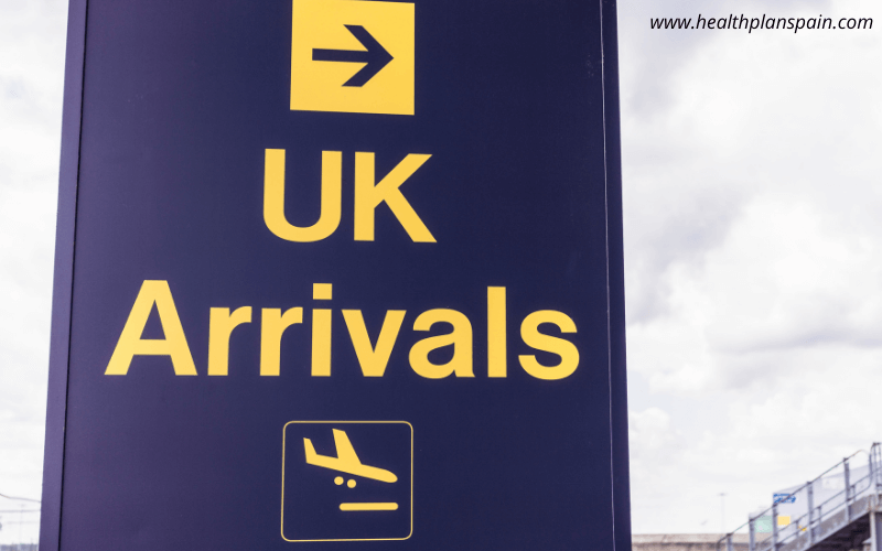 UK arrivals sign